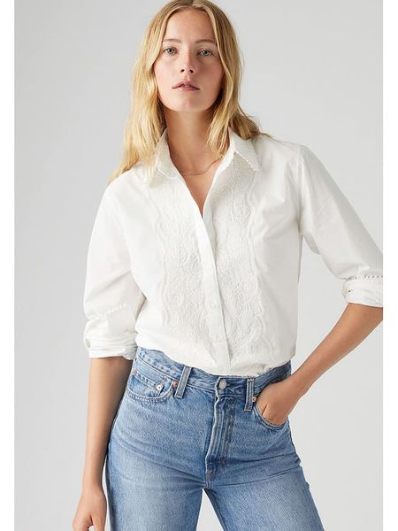 Levi's Bluzka w kolorze kremowym rozmiar: XS. Brązowe bluzki Levi's®, s, bez wzorów, z bawełny, bez kołnierzyka, bez ramiączek. Za 162,11 zł.