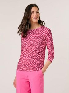 Gerry Weber Koszulka w kolorze biało-jasnoróżowo-czerwonym rozmiar: 42. Białe bluzki Gerry Weber, bez wzorów, z bawełny, bez kołnierzyka, bez ramiączek. Za 127,35 zł.