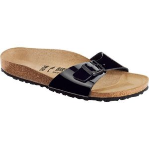 Klapki damskie Birkenstock 040303. Czarne klapki Birkenstock, bez wzorów, z materiału, bez obcasa. Za 406,65 zł.