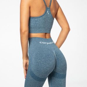 Legginsy bezszwowe Carpatree Allure niebieski melanż. Niebieskie legginsy Carpatree, bez wzorów, z elastanu. W wyprzedaży za 129,99 zł.