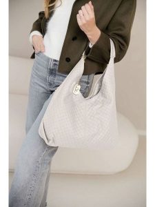 Anna Morellini Skórzany shopper bag "Nicolina" w kolorze kremowym - 41 x 42 x 11 cm rozmiar: onesize. Brązowe shopper bag Anna Morellini, bez wzorów, z materiału, na ramię, bez dodatków. Za 386,53 zł.