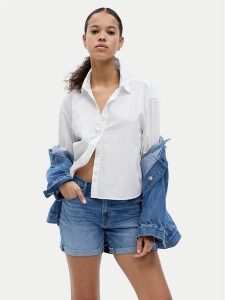 Gap Szorty jeansowe 570596-02 Niebieski Regular Fit. Niebieskie szorty GAP, bez wzorów, z bawełny. Za 119,99 zł.