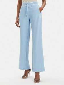 Juicy Couture Spodnie dresowe Kurt JCSBJ224418 Błękitny Regular Fit. Niebieskie spodnie dresowe Juicy Couture, l, bez wzorów, z dresówki. Za 349,99 zł.