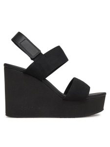 Calvin Klein Jeans Sandały Wedge Sandal Webbing In YW0YW01790 Czarny. Czarne sandały Calvin Klein Jeans, bez wzorów, z jeansu, bez obcasa, na koturnie, bez zapięcia. Za 249,99 zł.