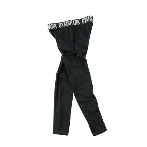 Second life - Legginsy damskie do jogi Gymshark - Jak nowy. Czarne legginsy Gymshark, bez wzorów, z materiału. Za 106,46 zł.