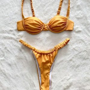 Bikini z marszczeniem elastyczne na plażę i basen Slavejka. Żółte bikini Intica, bez wzorów. Za 159,00 zł.