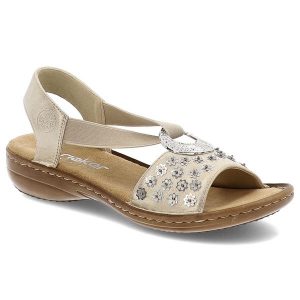 Beżowe Sandały Rieker Eleganckie Obuwie Damskie. Brązowe sandały Rieker, bez wzorów, z materiału, bez obcasa, na koturnie, bez zapięcia. Za 299,00 zł.