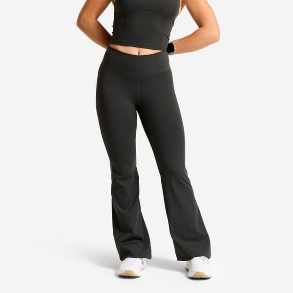 Legginsy sportowe damskie Domyos flare. Szare legginsy DOMYOS, bez wzorów, z lycry, z podwyższonym stanem, długie. Za 129,99 zł.