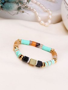 Charlize Pozłacana bransoletka z jaspisami i kamieniami ozdobnymi rozmiar: onesize. Brązowe bransoletki Charlize, z jaspisem, pozłacane. Za 87,40 zł.