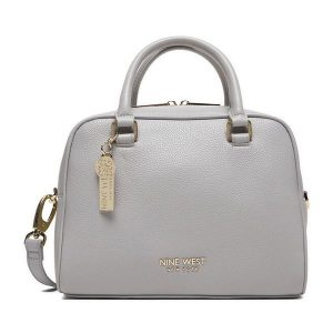 Torebka Nine West. Niebieskie torebki klasyczne Nine West, bez wzorów, bez dodatków. Za 349,99 zł.
