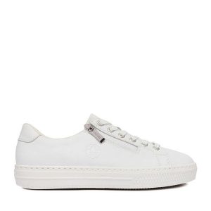 Tenisówki Rieker. Białe trampki Rieker, bez wzorów, bez zapięcia. Za 359,99 zł.