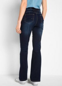 Modelujące dżinsy o kroju bootcut, mid waist. Niebieskie spodnie z wysokim stanem bonprix, bez wzorów, z jeansu. Za 147,99 zł.
