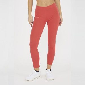 Legginsy do jogi damskie z elastycznej bawełny koralowe. Pomarańczowe legginsy LEGEA, bez wzorów, z bawełny, z podwyższonym stanem, długie. Za 60,00 zł.