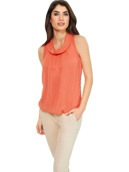 Heine Bluzka w kolorze pomarańczowym rozmiar: 42. Pomarańczowe bluzki Heine, bez wzorów, bez kołnierzyka, bez ramiączek. Za 47,94 zł.