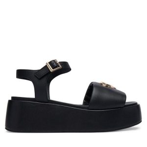 Sandały LOVE MOSCHINO. Czarne sandały LOVE MOSCHINO, bez wzorów, bez obcasa, na koturnie, bez zapięcia. Za 594,99 zł.