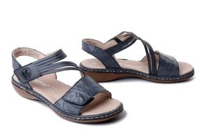 Rieker 65964-12 Niebieski, sandały damskie. Niebieskie sandały Rieker, bez wzorów, ze skóry, bez obcasa, bez zapięcia. Za 319,90 zł.