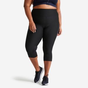Legginsy fitness damskie Domyos 7/8. Czarne legginsy DOMYOS, bez wzorów, z materiału, z podwyższonym stanem, długie. Za 79,99 zł.