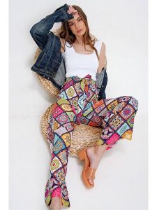 Trend Alacati Spodnie ze wzorem rozmiar: L. Spodnie z wysokim stanem Trend Alacati, bez wzorów, z materiału, z podwyższonym stanem. Za 95,95 zł.