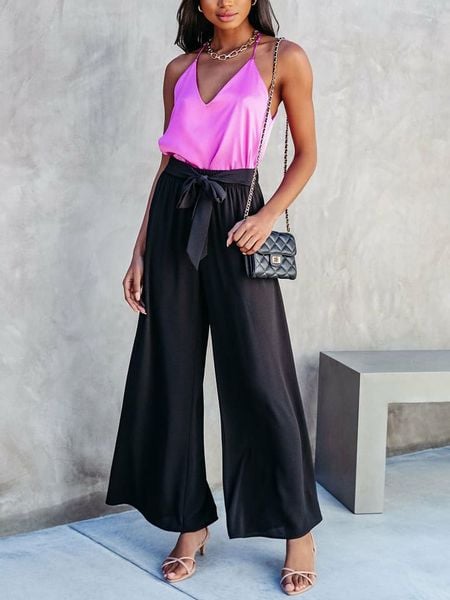 LA Angels Spodnie w kolorze czarnym rozmiar: M. Czarne spodnie z wysokim stanem LA Angels, bez wzorów, z materiału, z podwyższonym stanem. Za 130,99 zł.