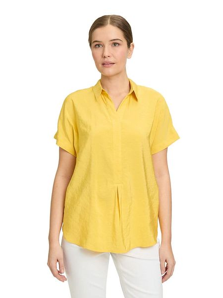 Betty Barclay Bluzka w kolorze żółtym rozmiar: 38. Żółte bluzki Betty Barclay, bez wzorów, bez kołnierzyka, bez ramiączek. Za 88,02 zł.