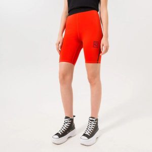 LEGGINSY DAMSKIE SZORTY KRÓTKIE PUMA VOGUE TIGHT SHORTS PRZED KOLANO CZERWONE. Czerwone legginsy Puma, bez wzorów, z materiału, krótkie. Za 175,64 zł.