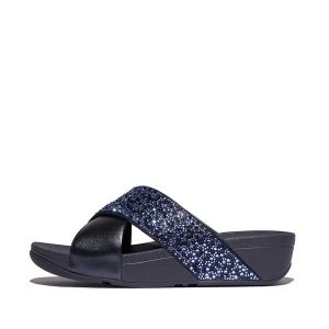 Klapki damskie FitFlop Lulu Crystal-Mix Metallic Cross. Niebieskie klapki FIT FLOP, bez wzorów, bez obcasa. Za 477,50 zł.