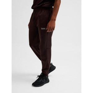 Spodnie do biegania Hummel Tech Regular. Brązowe szorty Hummel, bez wzorów, z dresówki, sportowe. Za 304,00 zł.