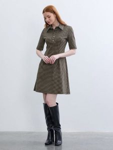 BGN Sukienka w kolorze czarno-musztardowym rozmiar: 40. Czarne sukienki BGN, na imprezę, bez wzorów, bez kołnierzyka, bez ramiączek, mini. Za 143,99 zł.