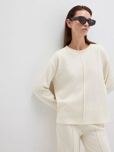 MAVI Sweter w kolorze kremowym rozmiar: XL. Brązowe swetry oversize Mavi, xl, bez wzorów, z bawełny, bez ramiączek. Za 99,95 zł.