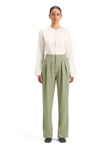 Scotch & Soda Spodnie w kolorze jasnozielonym rozmiar: S/L32. Zielone spodnie z wysokim stanem Scotch & Soda, bez wzorów, z materiału, z podwyższonym stanem. Za 197,63 zł.