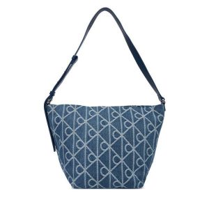 Torebka Calvin Klein. Niebieskie torebki klasyczne Calvin Klein, bez wzorów, z denimu, bez dodatków. Za 529,99 zł.