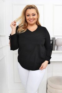 Elegancka czarna bluzka z rozciętymi rękawami PLUS SIZE XXL. Czarne bluzki Nasi partnerzy, plus size, bez wzorów, z poliesteru, eleganckie, bez kołnierzyka, plus size, bez ramiączek. Za 199,90 zł.