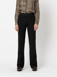 Toni Spodnie w kolorze czarnym rozmiar: 46. Czarne spodnie z wysokim stanem Toni, bez wzorów, z materiału, z podwyższonym stanem. Za 173,99 zł.