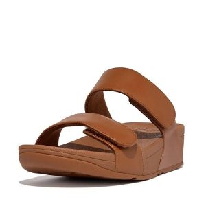 Skórzane sandały dla kobiet FitFlop Lulu Adjustable. Czarne sandały Flip Flop, bez wzorów, ze skóry, bez obcasa, bez zapięcia. Za 478,50 zł.