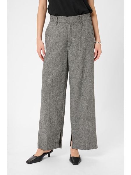 Kaffe Spodnie w kolorze czarno-białym rozmiar: 42. Czarne spodnie z wysokim stanem Kaffe, bez wzorów, z materiału, z podwyższonym stanem. Za 161,34 zł.