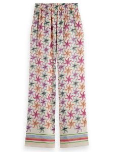 Scotch & Soda Spodnie w kolorze białym ze wzorem rozmiar: L/L30. Białe spodnie z wysokim stanem Scotch & Soda, bez wzorów, z lyocellu, z podwyższonym stanem. Za 193,24 zł.