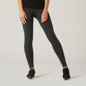 Legginsy fitness damskie Nyamba 100 Salto. Czarne legginsy DOMYOS, bez wzorów, z bawełny. Za 29,99 zł.