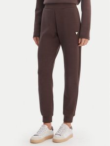 Guess Spodnie dresowe V4YB08 KCAY2 Brązowy Regular Fit. Brązowe spodnie dresowe Guess, xxs, z aplikacjami, z dresówki. Za 349,99 zł.