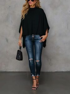 Milan Kiss Bluzka w kolorze czarnym rozmiar: XL. Czarne bluzki Milan Kiss, xl, bez wzorów, bez kołnierzyka, bez ramiączek. Za 130,99 zł.