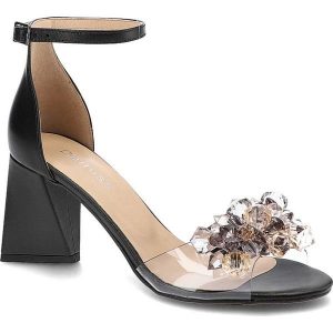 Czarne Sandały Damiss Eleganckie Skórzane Buty Na Obcasie. Czarne sandały Damiss, z aplikacjami, ze skóry, bez obcasa, na obcasie, bez zapięcia. Za 379,00 zł.