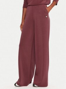 Guess Spodnie dresowe V4YB07 KCAY2 Bordowy Relaxed Fit. Czerwone spodnie dresowe Guess, xl, z aplikacjami, z dresówki. Za 319,99 zł.