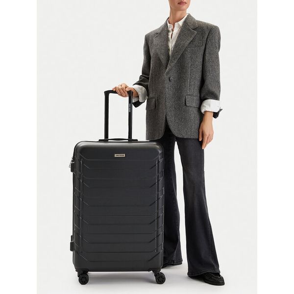 Walizka duża GINO ROSSI. Czarne walizki Gino Rossi, bez wzorów, duże. Za 299,99 zł.