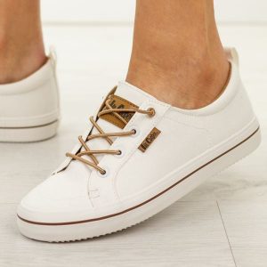 Białe trampki damskie Lee Cooper 4058. Białe trampki Lee Cooper, bez wzorów, z gumy, bez zapięcia. Za 159,00 zł.