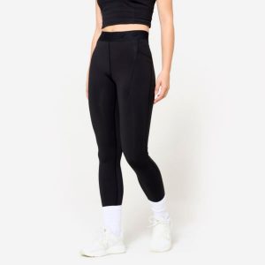Legginsy fitness damskie Domyos. Fioletowe legginsy DOMYOS, bez wzorów, z elastanu. W wyprzedaży za 69,99 zł.