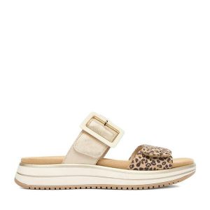 Klapki Remonte. Żółte klapki Remonte, bez wzorów, bez obcasa. Za 359,99 zł.