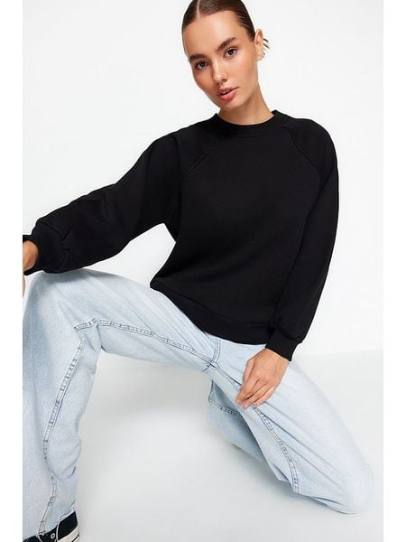 Trendyol Bluza w kolorze czarnym rozmiar: L. Czarne bluzy Trendyol, l, bez wzorów, bez kaptura. Za 78,99 zł.