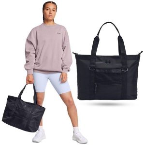 Torba sportowa na ramię damska Under Armour UA Studio 22 litry. Czarne torby podróżne i sportowe Under Armour, bez wzorów, na ramię. Za 229,99 zł.