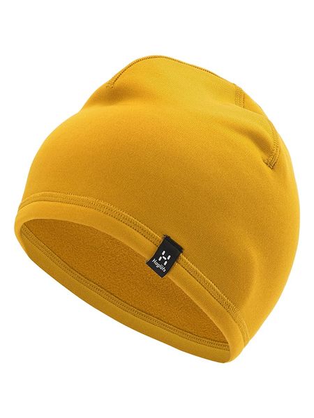 Haglöfs Czapka beanie "Betula" w kolorze musztardowym rozmiar: M/L. Żółte czapki Haglöfs, z aplikacjami, z materiału. Za 97,87 zł.