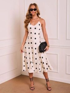 Milan Kiss Sukienka w kolorze biało-czarnym rozmiar: L. Białe sukienki Milan Kiss, l, bez wzorów, z wiskozy, bez kołnierzyka, bez ramiączek, midi, rozkloszowane. Za 195,99 zł.