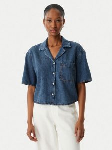 Tommy Jeans Koszula jeansowa DW0DW22216 Niebieski Relaxed Fit. Niebieskie koszule Tommy Jeans, xs, bez wzorów, z bawełny, bez kołnierzyka, bez ramiączek. Za 409,99 zł.